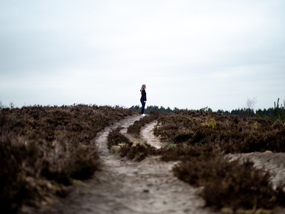 person on path of discovery