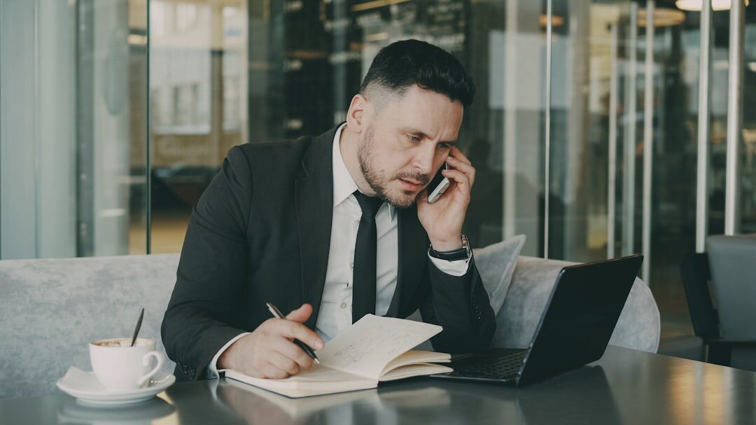 man taking notes